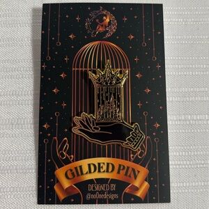 Gilded Crown & Hand Brooch Pin